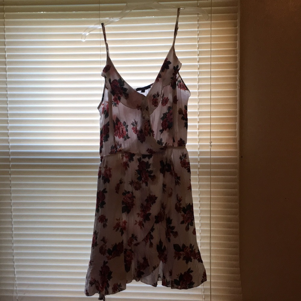 V-neck mini maxi dress with flowers on it